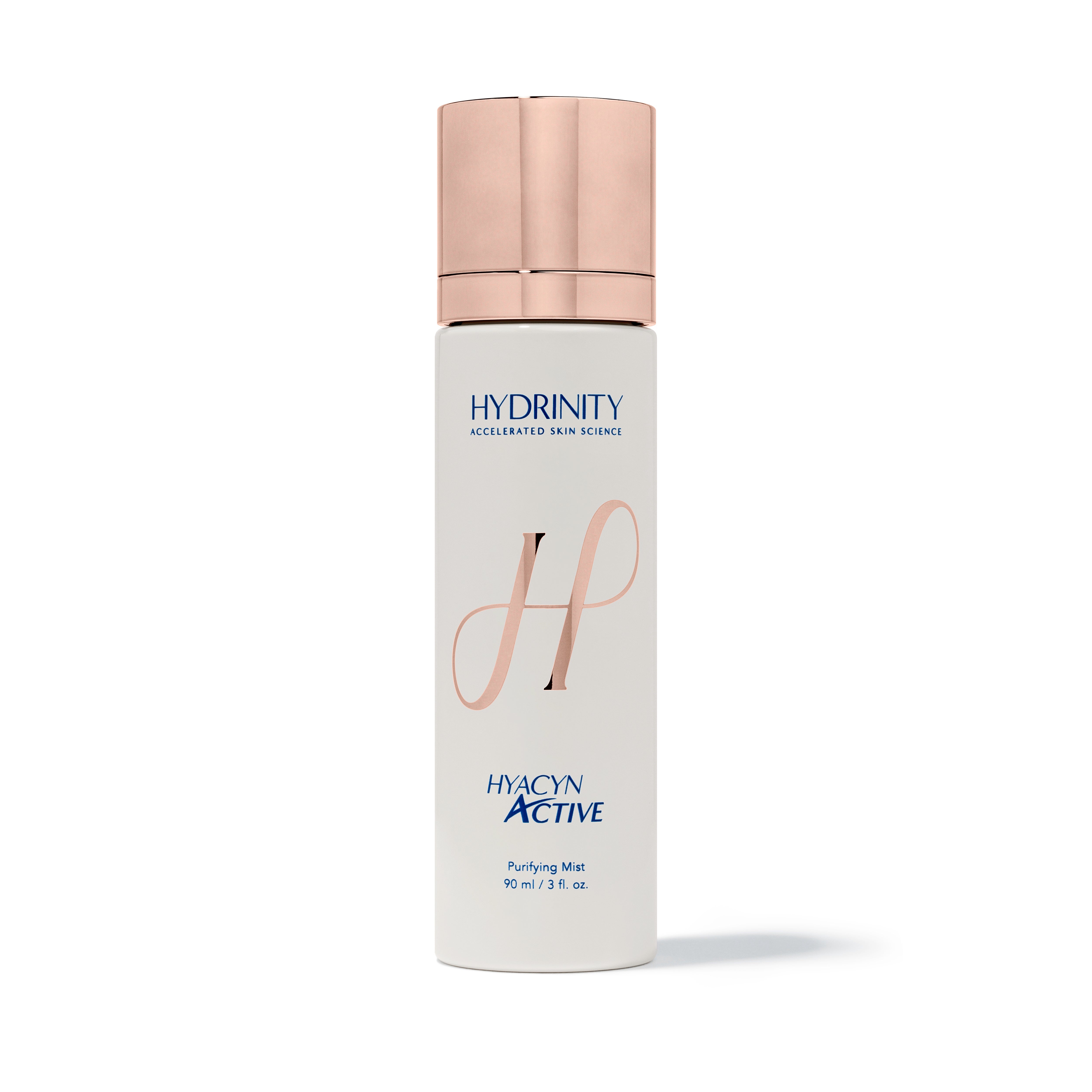 A cylindrical skincare bottle of Hydrinity Hyacin Active Purifying Mist on a clean white background. The bottle is off-white with a metallic rose gold cap and features the brand name 'HYDRINITY' and product name 'HYACYN ACTIVE' in blue text, along with a stylized rose gold 'HP' logo.
